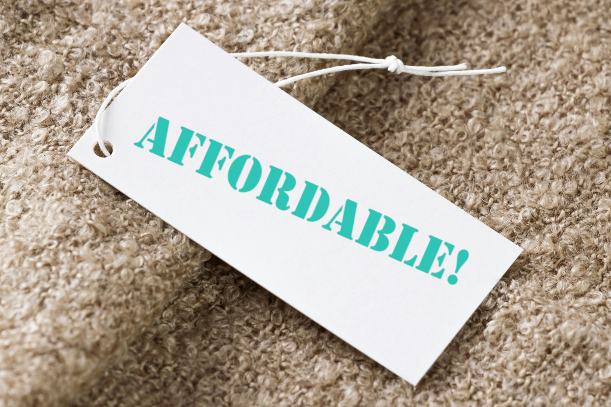 Image of a price tag with the text 'affordable' in stencil font.